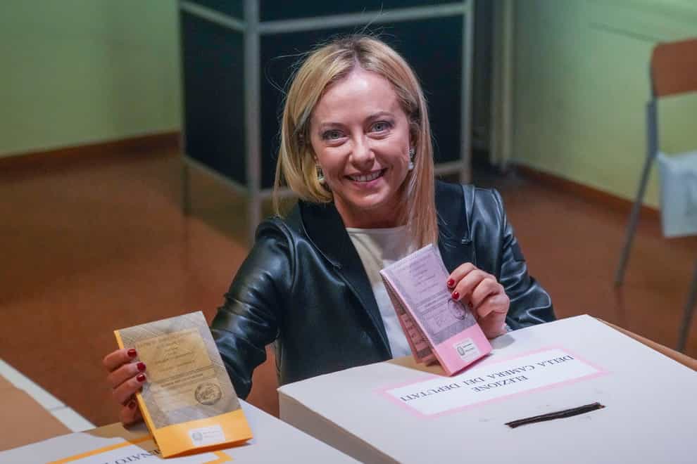Far-right Brothers of Italy’s leader Giorgia Meloni votes at a polling station in Rome (Alessandra Tarantino/AP)