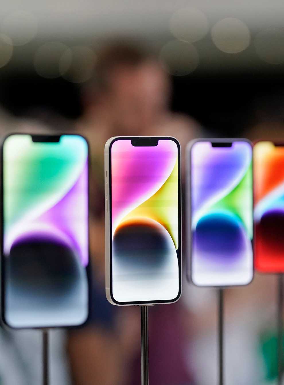 New iPhone 14 models on display at an Apple event on the campus of Apple’s headquarters in California (Jeff Chiu/AP)