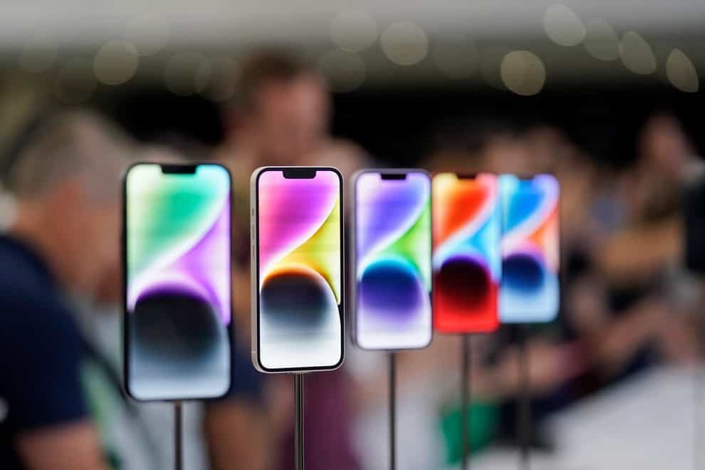 New iPhone 14 models on display at an Apple event on the campus of Apple’s headquarters in California (Jeff Chiu/AP)