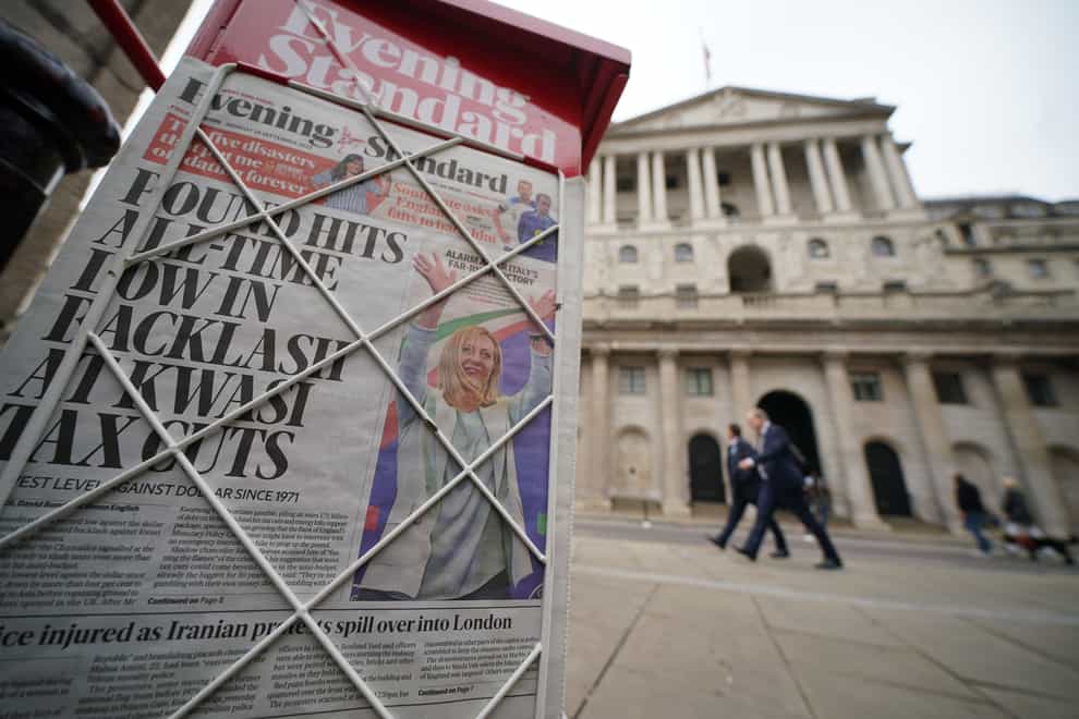 London’s Evening Standard newspaper, with the headline “Pound hits all-time low in backlash at Kwasi tax cuts” on display outside the Bank of England in the city of London (Yui Mok/PA)