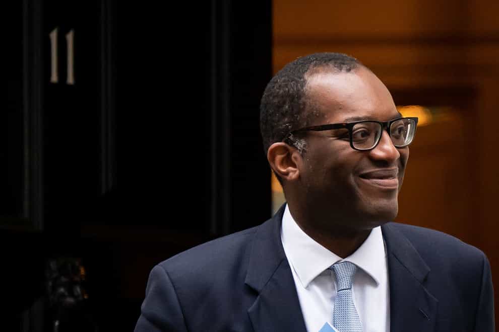 Chancellor of the Exchequer Kwasi Kwarteng leaves 11 Downing Street to make his way to the Treasury Department to deliver his mini-budget (Aaron Chown/PA)