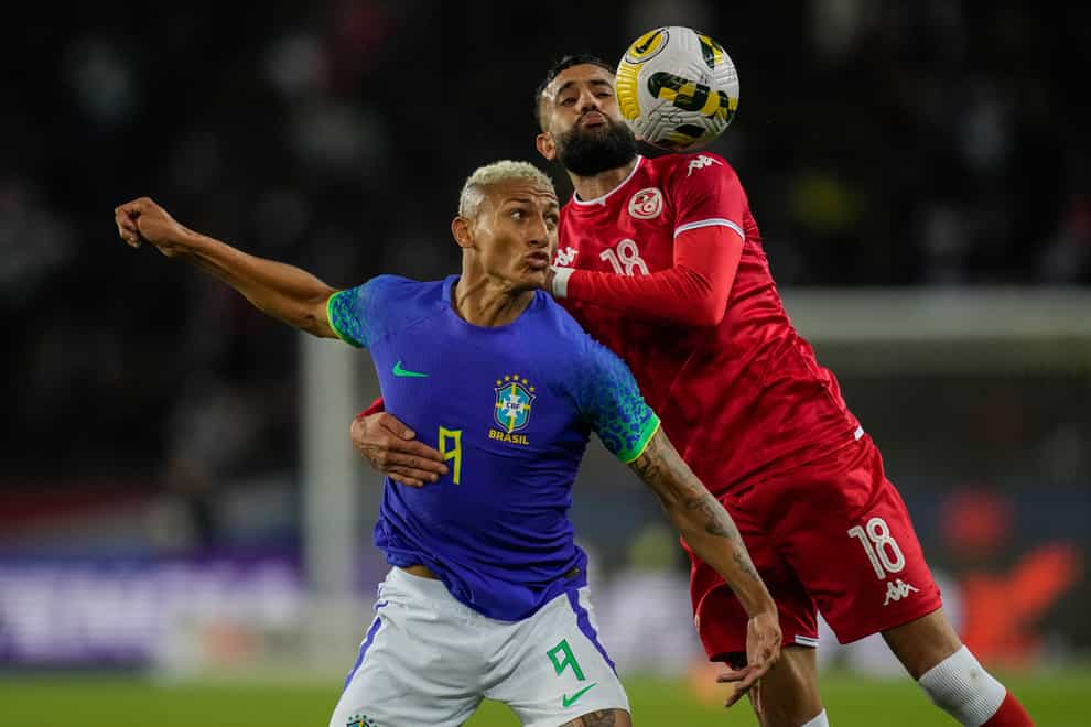 Richarlison, left, suffered racial abuse during Brazil’s friendly win over Tunisia (Christophe Ena/AP/Press Association Images)