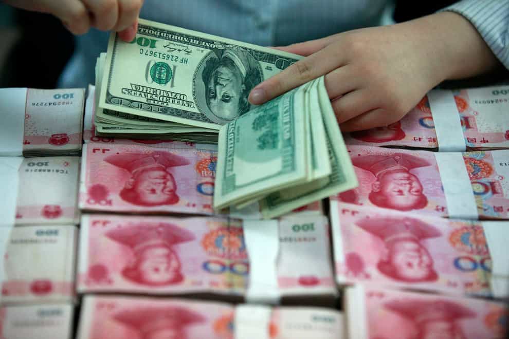 The yuan fell to 7.2301 to the dollar, its lowest level since January 2008 (Alamy/PA)