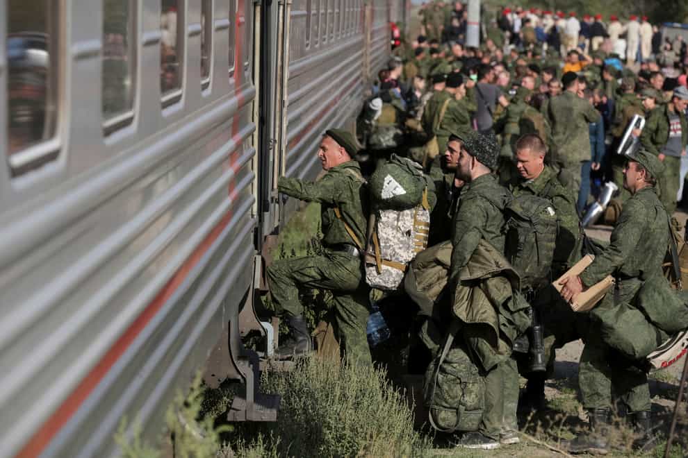 Russian recruits take a train at a railway station in Prudboi, Volgograd region of Russia (AP)