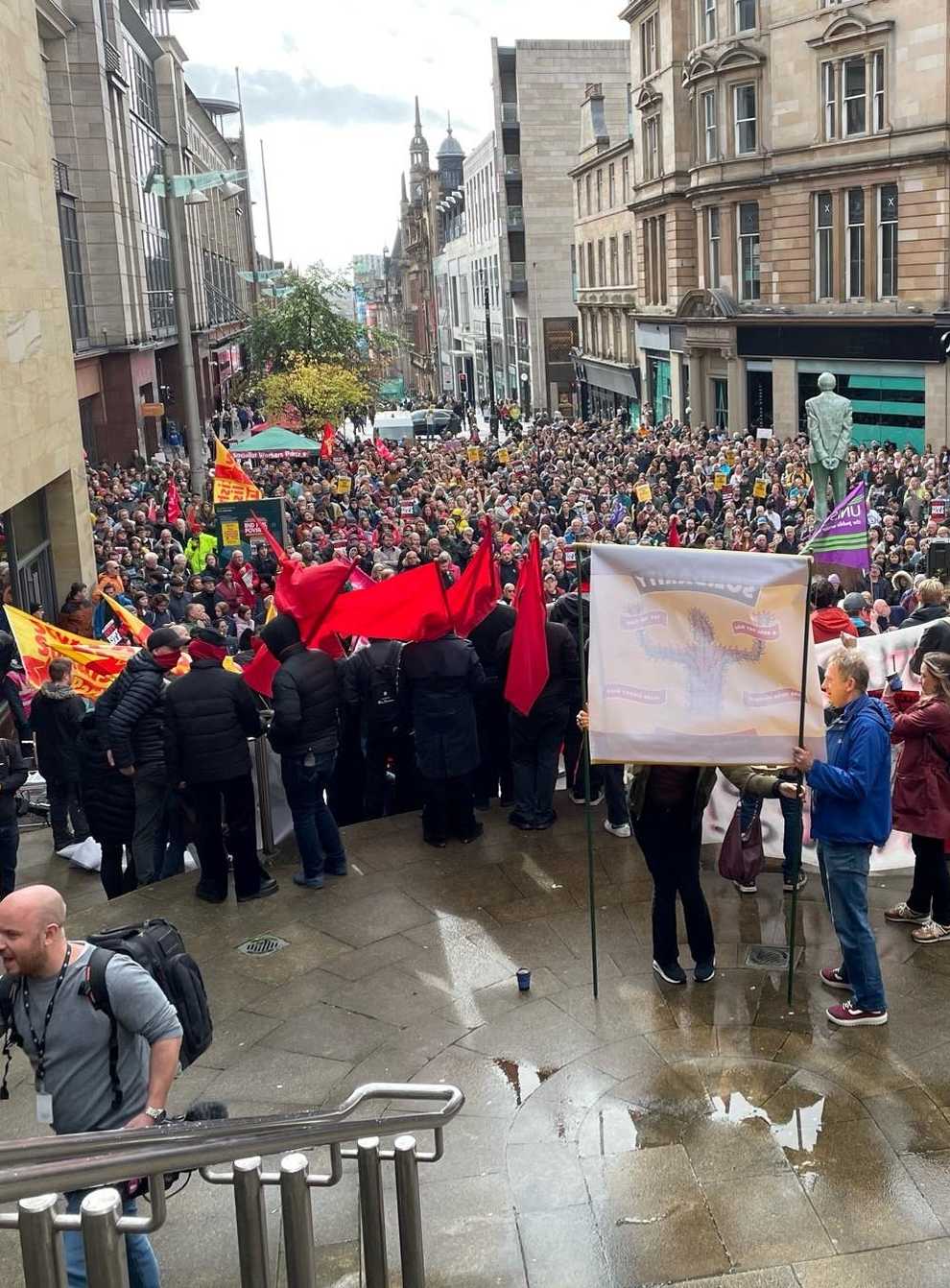 Thousands gathered on the steps at Buchanan Galleries to protest against the rising cost of living in Glasgow on Saturday (Lauren Gilmour/PA)