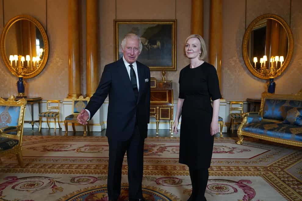 King Charles welcomes Liz Truss at Buckingham Palace (Yui Mok/PA)