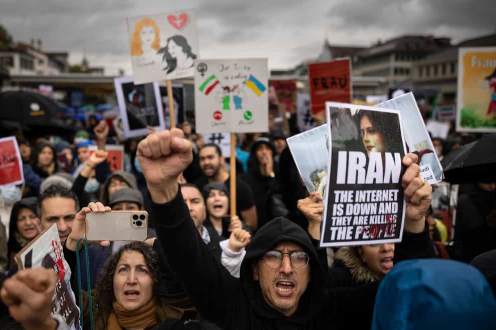 People in Zurich protest over the death of Mahsa Amini in police custody in Iran (Michael Buholzer/Keystone/AP)