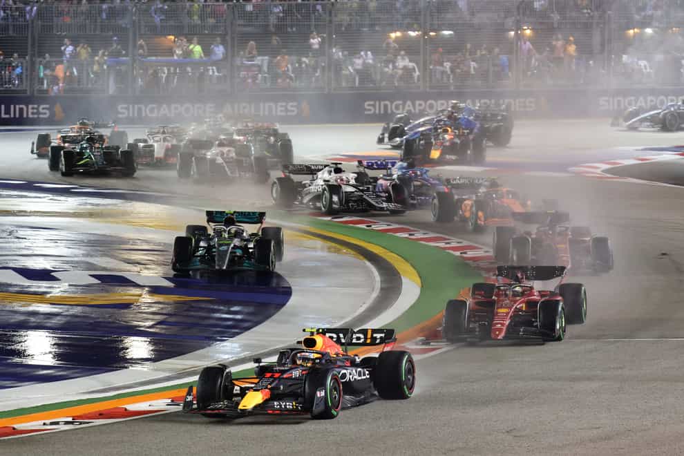 Red Bull driver Sergio Perez claimed victory in a chaotic race (Danial Hakim/AP)