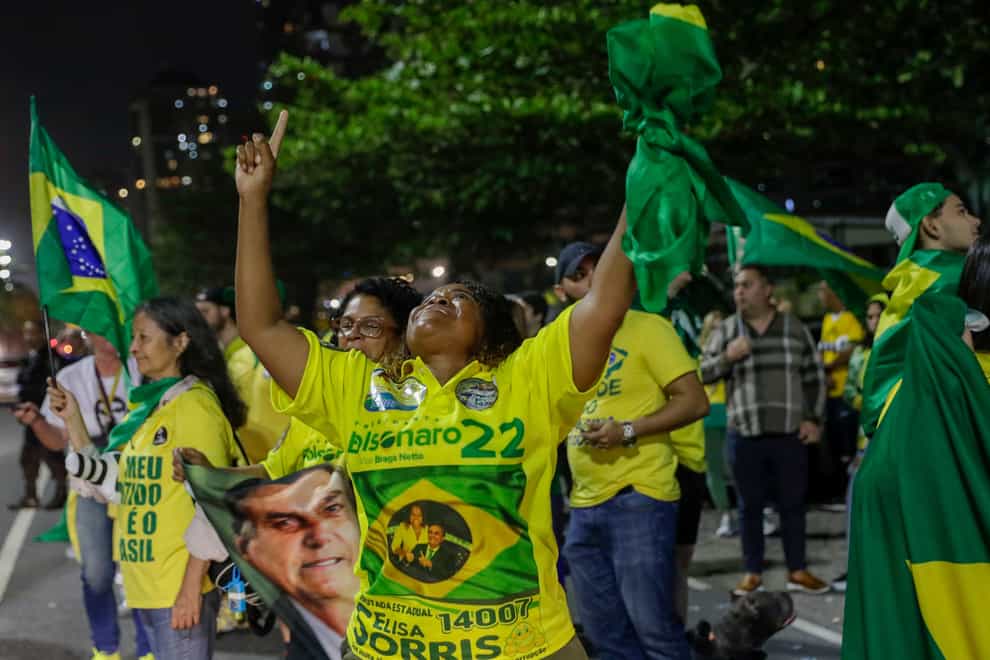 It appears increasingly likely neither of the top two candidates in Brazil’s highly polarised election race will receive more than 50% of the valid votes, meaning a second round vote will be scheduled for October 30 (Bruna Prado/AP)