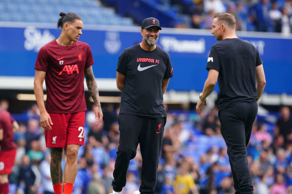 Liverpool’s Darwin Nunez (left) and manager Jurgen Klopp warming up before the Premier League match at Goodison Park, Liverpool. Picture date: Saturday September 3, 2022.