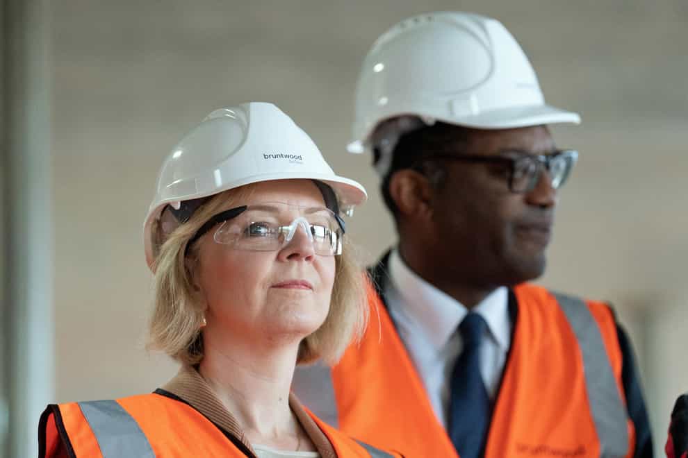 Prime Minister Liz Truss and Chancellor of the Exchequer Kwasi Kwarteng during a visit to a construction site (Stefan Rousseau/PA)