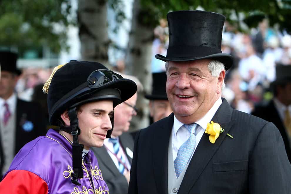 Ryan Moore (left) chats with trainer Sir Michael Stoute (John Walton/PA)