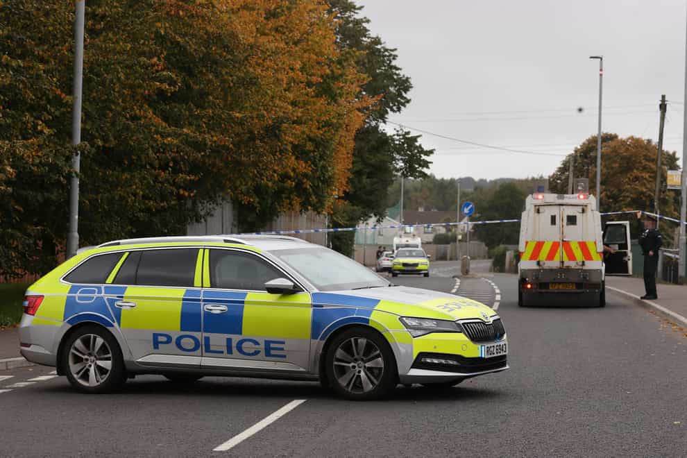 Police at the scene of the shooting on Sunday (Liam McBurney/PA)