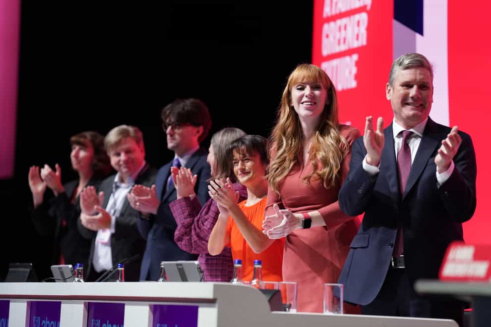 Labour Party leader Sir Keir Starmer (right) and deputy leader Angela Rayner (2nd right) applauding at the end of the Labour party conference in Liverpool (Stefan Rousseau/PA)