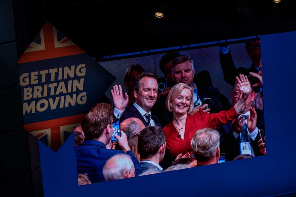 Prime Minister Liz Truss with her husband Hugh O’Leary after delivering her keynote speech at the Conservative Party conference (Aaron Chown/PA)