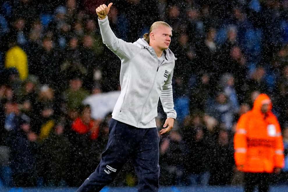 Erling Haaland gestures to the fans at the end of the match (Martin Rickett/PA)