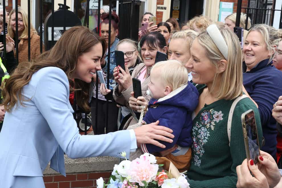 The Princess of Wales meeting one-year-old Barney Barr and his mother Laura-Ann Barr during a visit to PIPS Suicide Prevention (PIPS Charity) in Belfast which works across communities in the city and throughout Northern Ireland to provide crisis support for those at risk of suicide and self-harm, as part of the royal visit to Northern Ireland (Liam McBurney/PA)