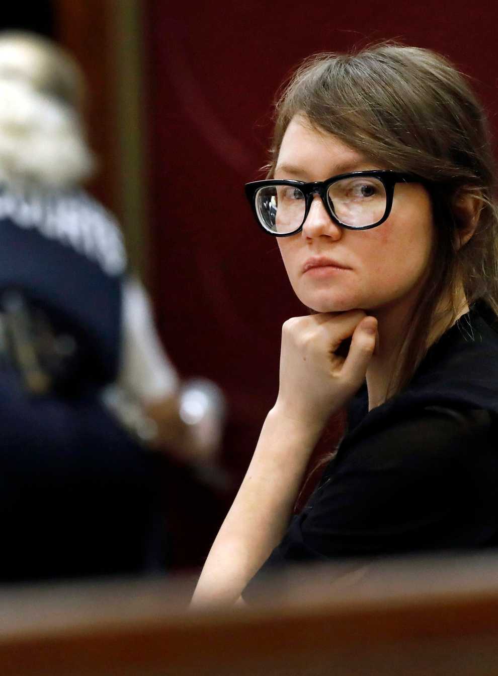 Anna Sorokin sits at the defence table during jury deliberations in her trial at New York State Supreme Court, April 25, 2019, in New York. A U.S. immigration judge cleared the way Wednesday, Oct. 5. 2022, for fake German heiress Anna Sorokin to be released from detention to home confinement while she fights deportation, if she meets certain conditions (Richard Drew/AP/PA)