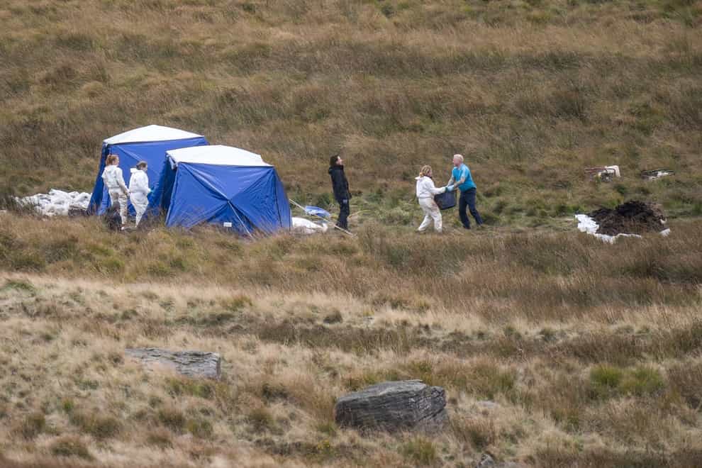 Officers from Greater Manchester Police have been searching an area on Saddleworth Moor (Danny Lawson/PA)