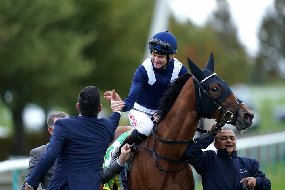 Robert Havlin celebrates winning the bet365 Fillies’ Mile with Commissioning during Dubai Future Champions Festival Friday at Newmarket Racecourse. Picture date: Friday October 7, 2022.