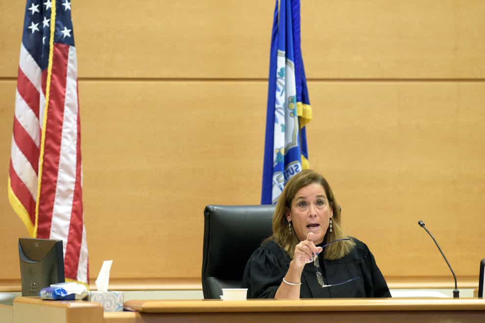 Superior Court Judge Barbara Bellis speaks with the attorneys during the Alex Jones Sandy Hook defamation damages trial in Superior Court in Waterbury, Conn., on Thursday, Oct. 2022 (H John Voorhees III/Hearst Connecticut Media via AP/PA)