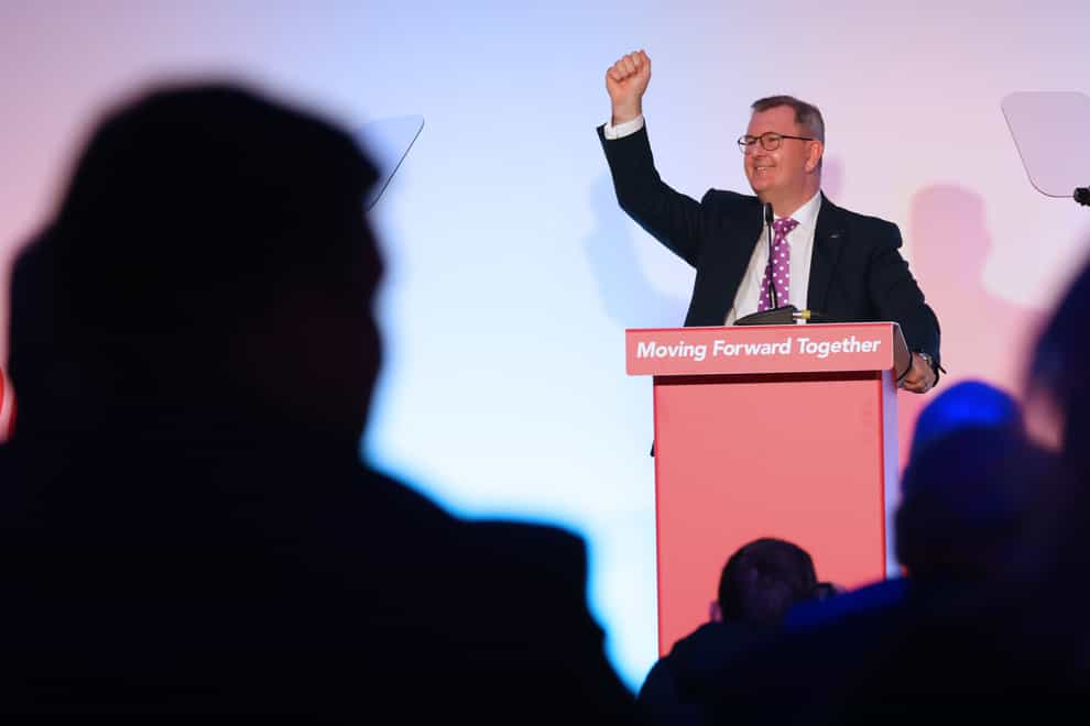 DUP party leader Sir Jeffrey Donaldson addresses delegates at their party conference (PA)
