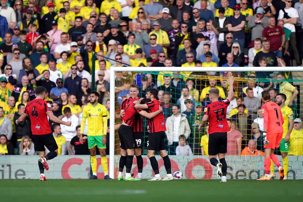 Emil Riis celebrates scoring Preston’s third goal at Norwich (Joe Giddens/PA)