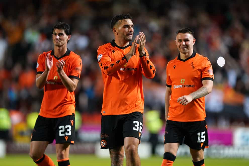 Tony Watt (centre) helped Dundee United to victory over Aberdeen (Andrew Milligan/PA)