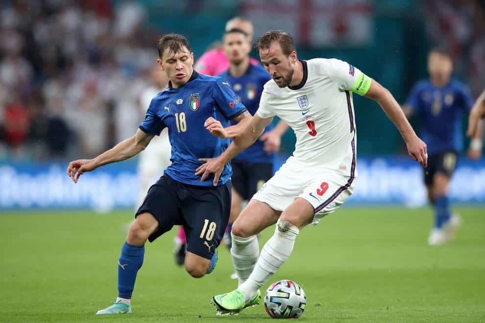 Italy’s Nicolo Barella, left, and England’s Harry Kane battle for the ball (Nick Potts/PA)
