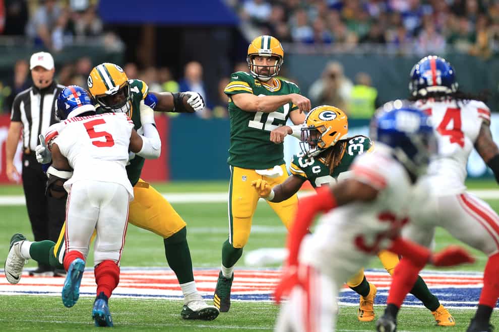 Aaron Rodgers, centre, and Green Bay were beaten in London (Bradley Collyer/PA)