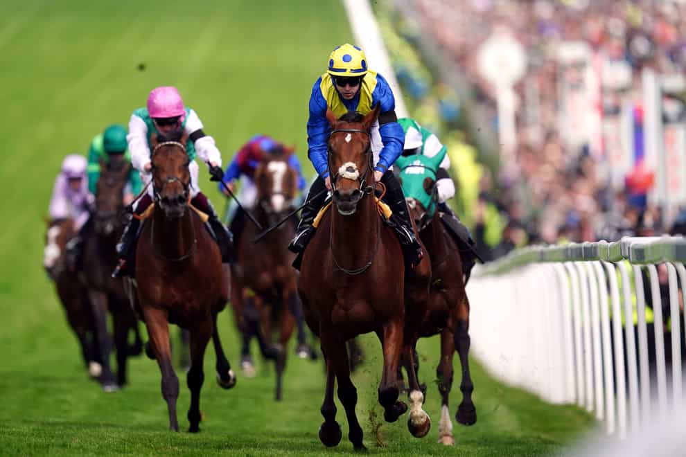 Desert Crown and Richard Kingscote cruised to Derby success at Epsom (David Davies/PA)