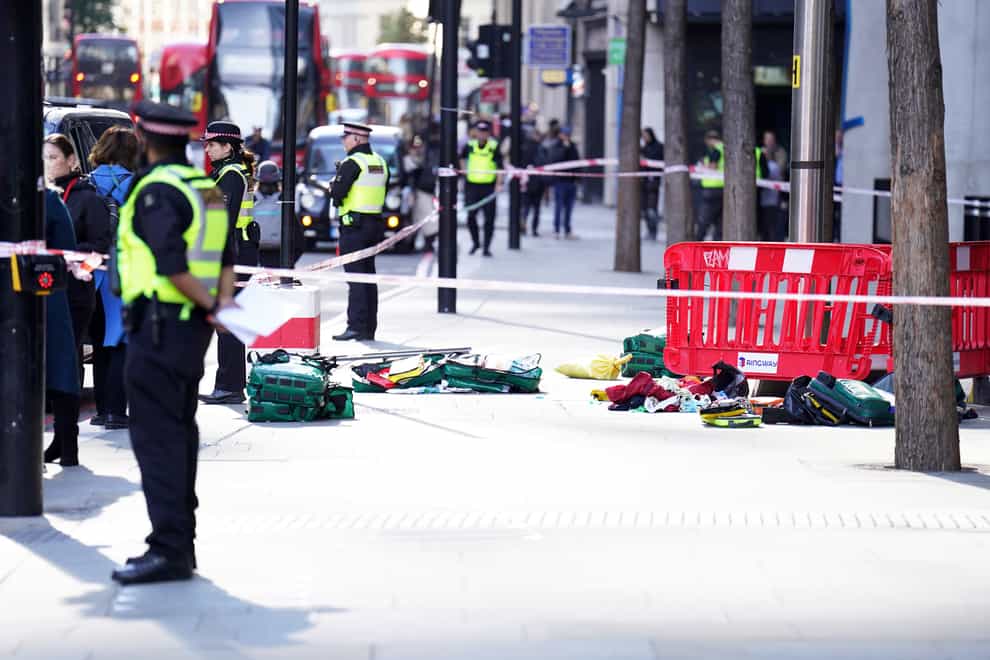 Police officers at the scene of the incident in Bishopsgate in the City of London (James Manning/PA).
