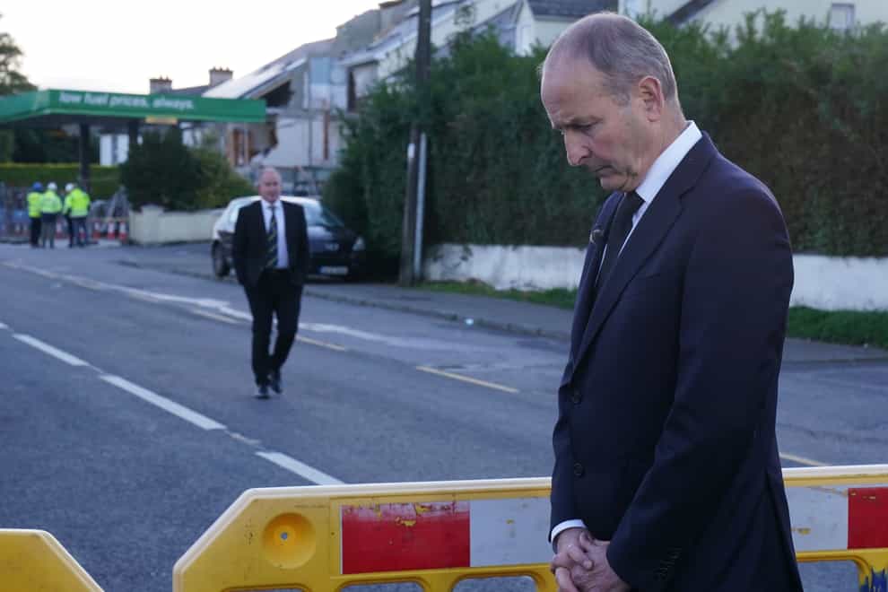 Taoiseach Micheal Martin prepares to speak to members of the media at the scene of an explosion at Applegreen service station in the village of Creeslough in Co Donegal. (Brian Lawless/PA)