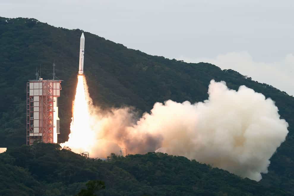 The Epsilon-6 rocket blasts off from the Uchinoura Space Centre (Kyodo News via AP)