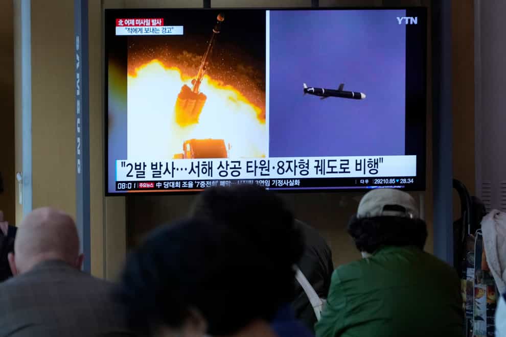 A TV screen shows images of North Korea’s missile launch during a news programme (Ahn Young-joon/AP)