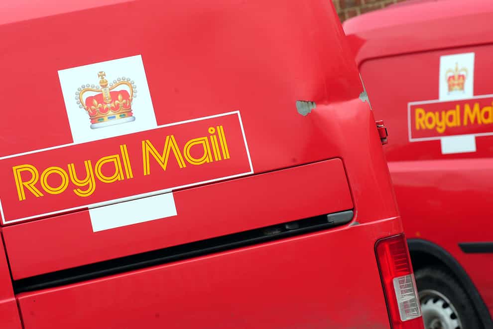 Royal Mail will consult on up to 6,000 redundancies as the delivery giant blamed industrial action for mammoth financial losses (PA)