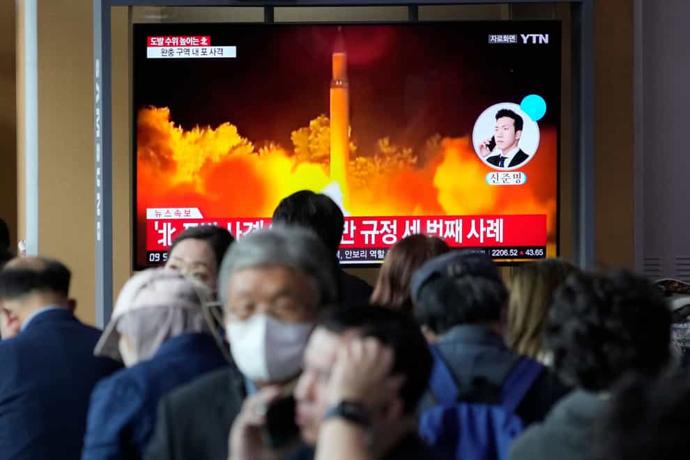 A TV screen shows a file image of North Korea’s missile launch during a news programme at the Seoul Railway Station (AP)