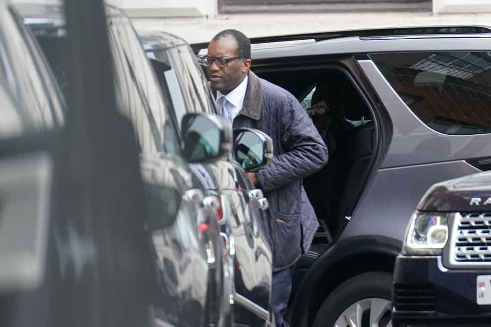 Kwasi Kwarteng arrives in Downing Street after returning from the US early (Stefan Rousseau/PA)