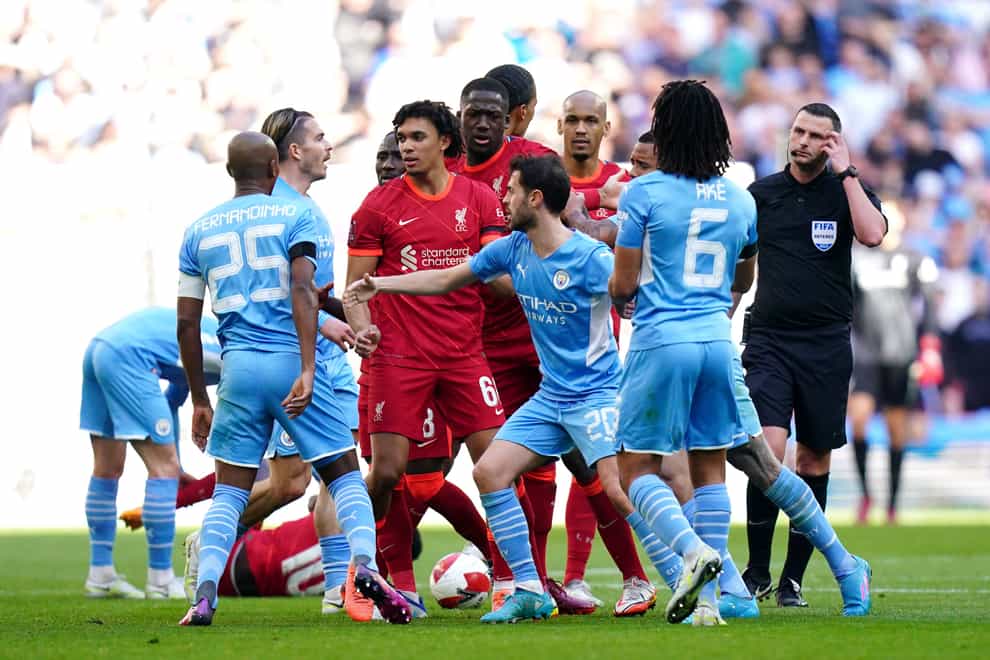 Liverpool and Manchester City go head-to-head on Sunday on their return from Champions League action (Adam Davy/PA)
