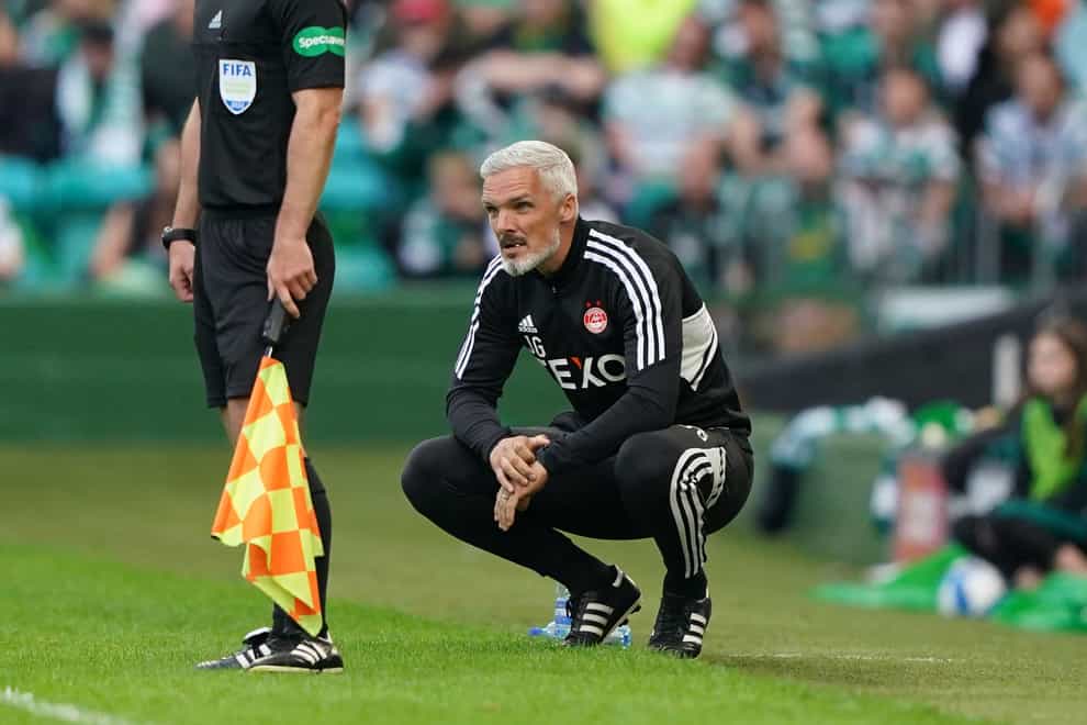 Jim Goodwin will be back on the touchline against Hearts (Andrew Milligan/PA)