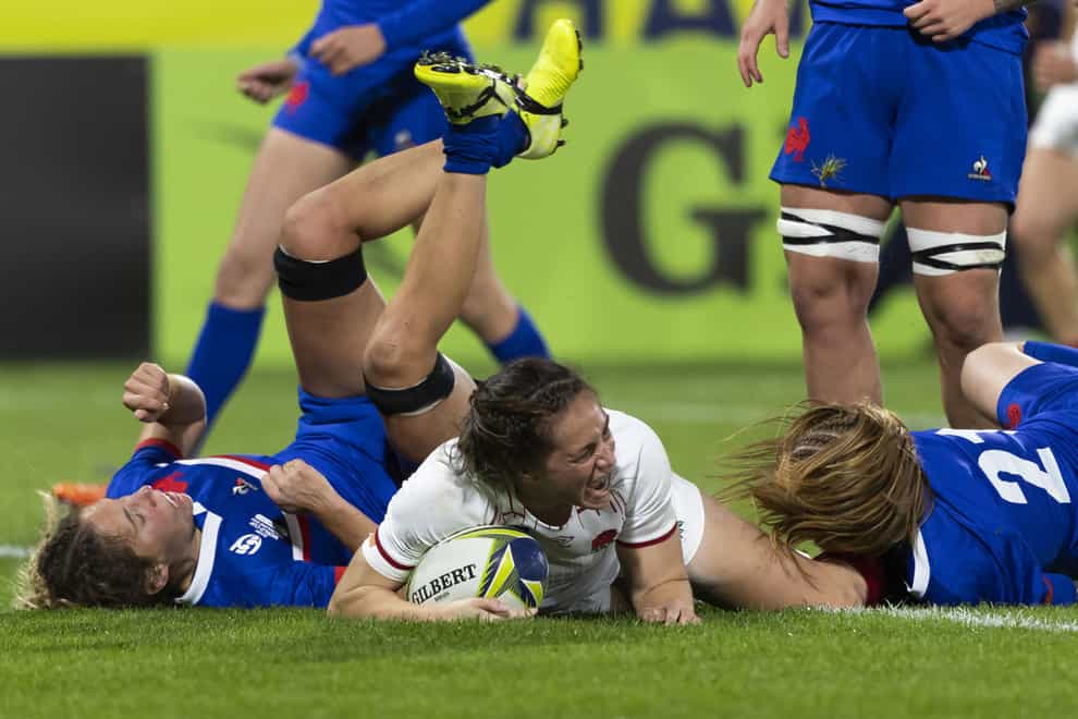 England’s Emily Scarratt dives over to score in the 13-7 Rugby World Cup victory over France (Brett Phibbs/PA)