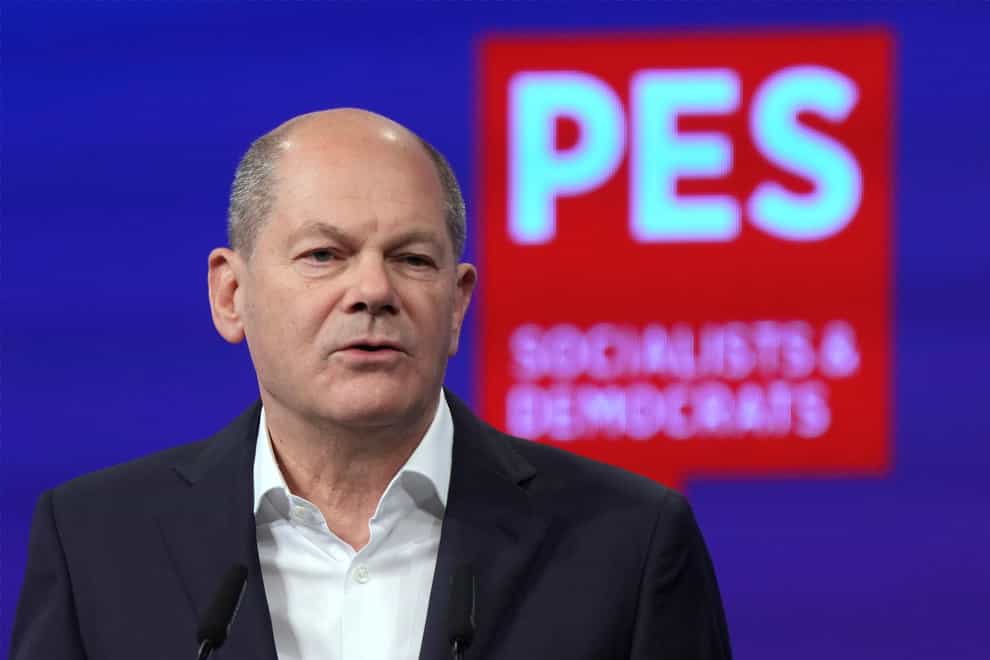 German Chancellor Olaf Scholz delivers a speech during a congress of the Party of European Socialists in Berlin (Michael Sohn/AP)