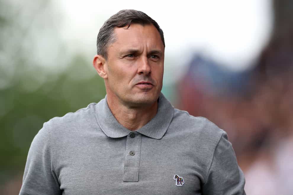 Paul Hurst hailed Grimsby’s mentality after beating 10-man Stockport (Bradley Collyer/PA)