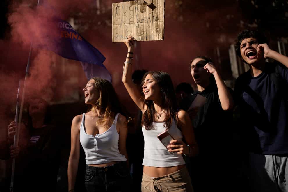 Protesters shout during a demonstration in Marseille (Daniel Cole/AP)