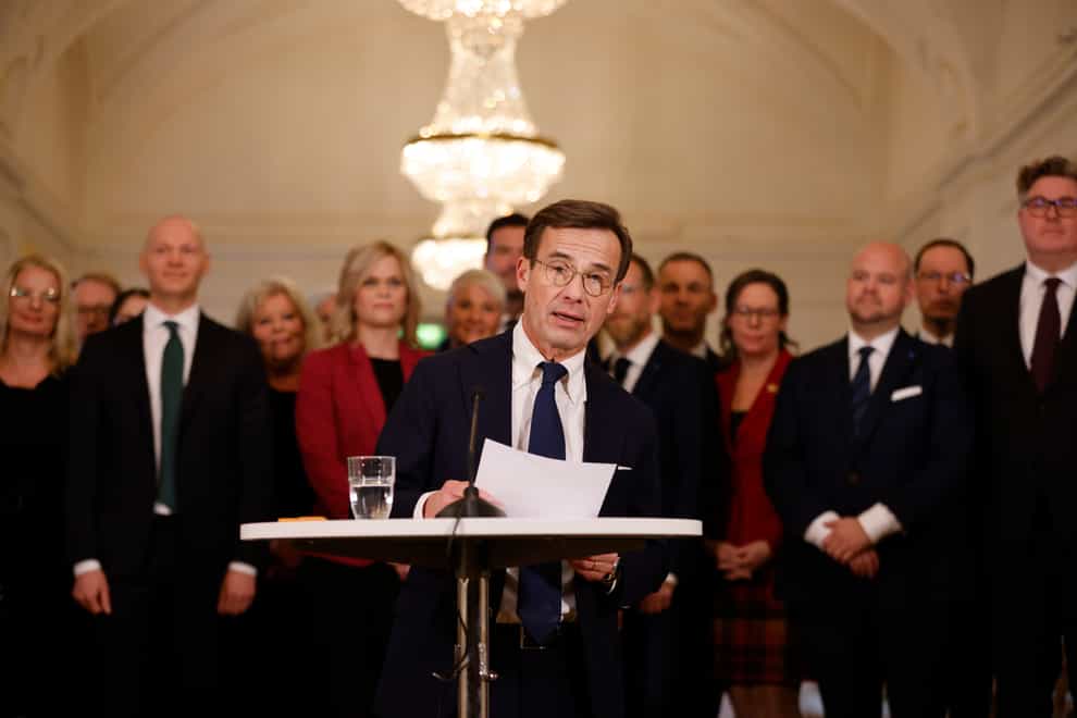 Swedish Prime Minister Ulf Kristersson holds a press meeting to present his cabinet ministers in Stockholm (Christine Olsson/TT News Agency/AP)