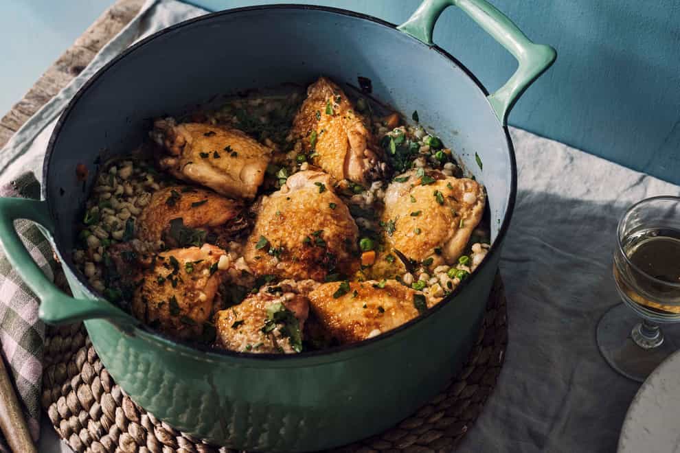 One-pot roast chicken with pearl barley, white wine and peas (Haarala Hamilton/PA)