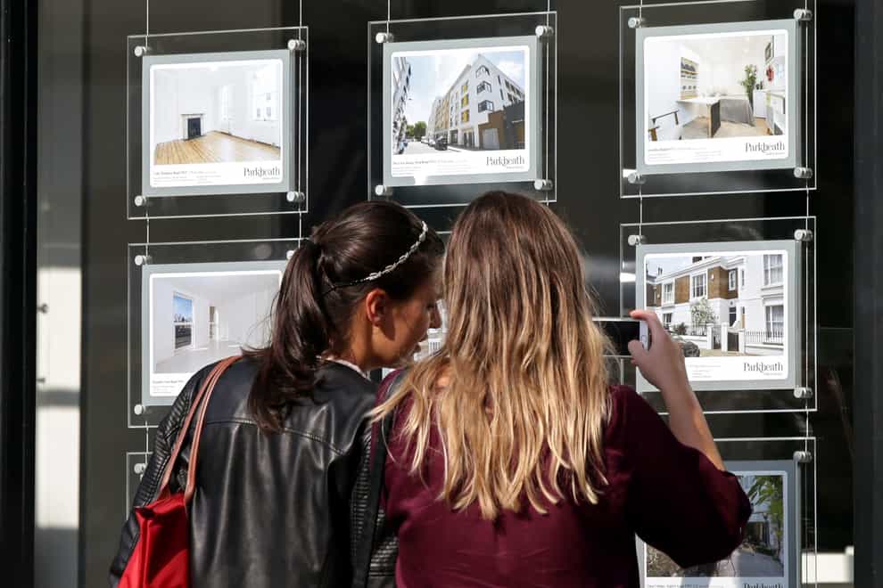 The average UK house price reached a record high of £296,000 in August after jumping by £36,000 annually, according to official figures (Yui Mok/PA)