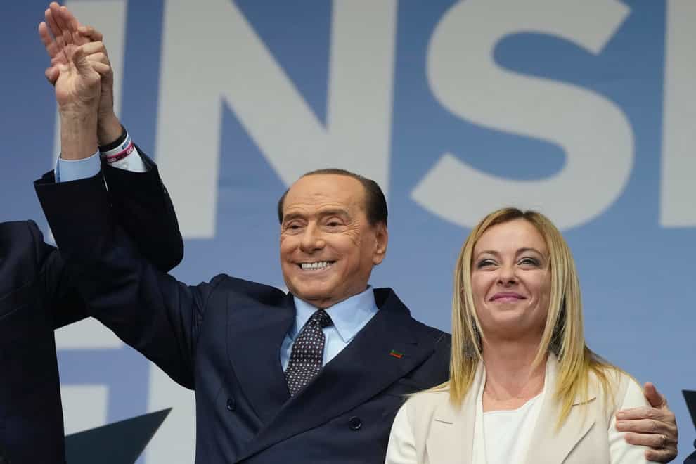 Silvio Berlusconi and Giorgia Meloni are expected to be in government together (Gregorio Borgia/AP)
