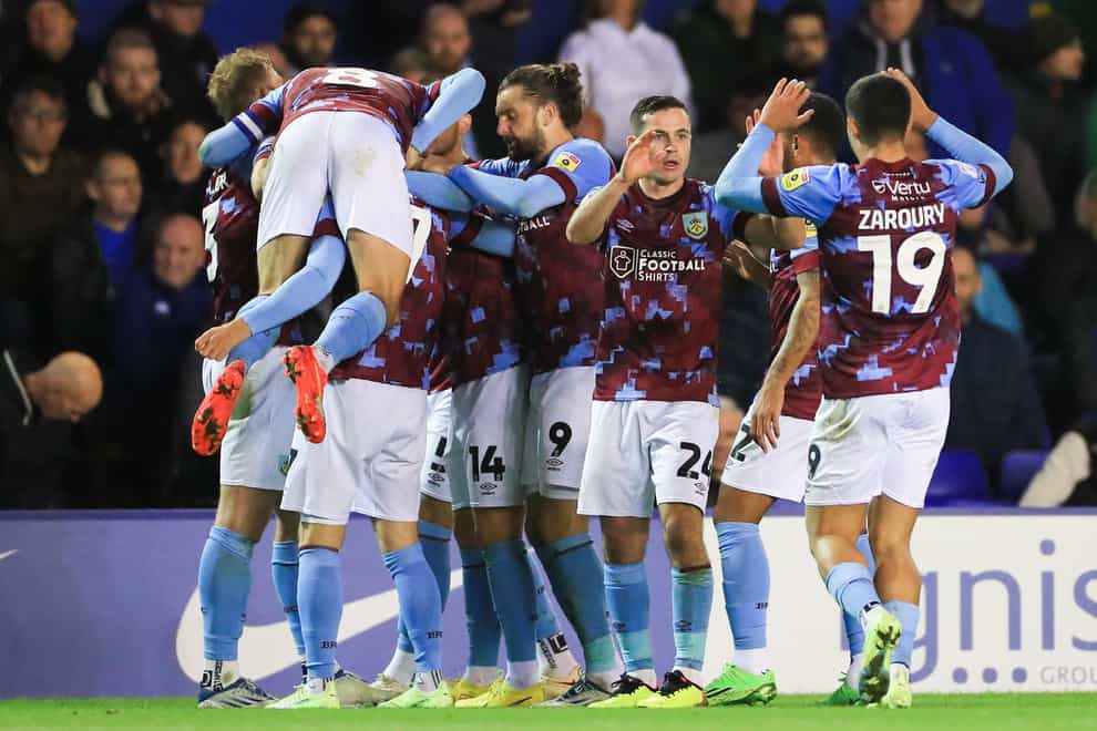 Burnley players celebrate after opening the scoring against Birmingham (Bradley Collyer/PA)