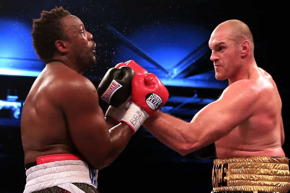 Tyson Fury and Derek Chisora will clash for a third time in December (Nick Potts/PA)
